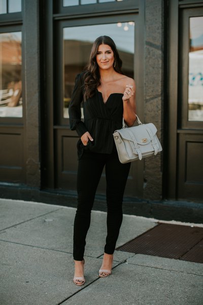 black top with one sleeve and matching skinny jeans
