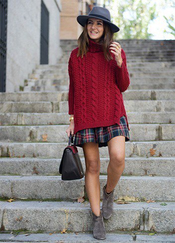 Oversized burgundy oversized knit sweater and red plaid skirt
