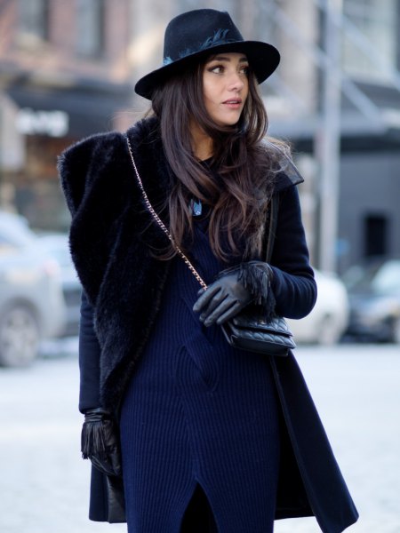 Dark blue ribbed sweater dress with a black faux fur coat