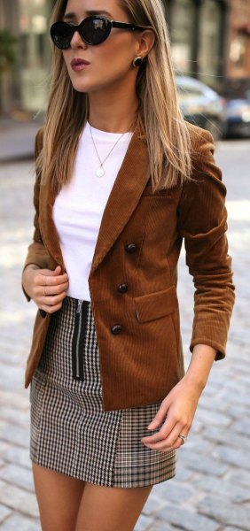 brown suede blazer with white top and plaid mini skirt