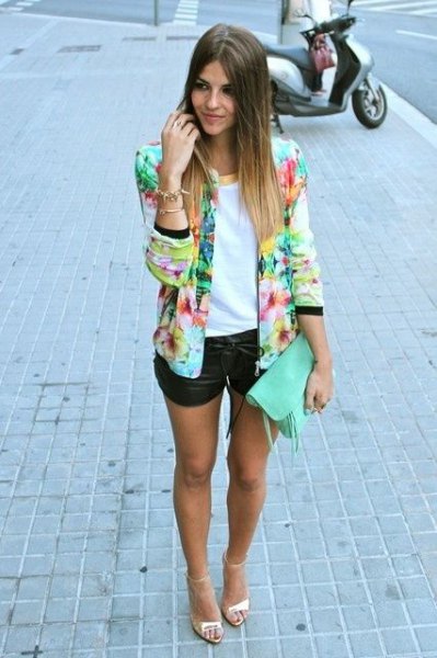 multicolored blazer with white top and black leather mini shorts