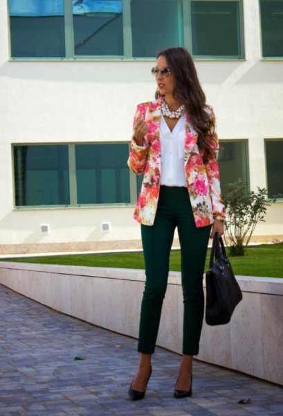 Blush pink blazer worn with a white linen shirt and black ankle jeans