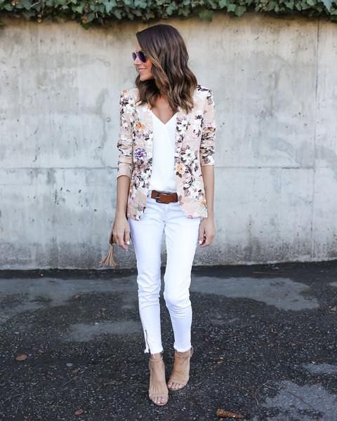 pink blazer with white V-neck top and matching cropped jeans