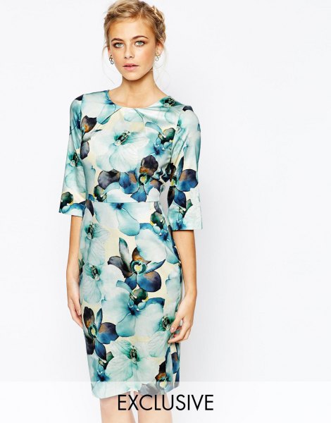 white and blue midi dress with wide sleeves and floral pattern
