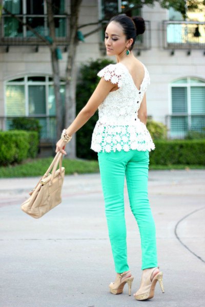 white lace peplum top with pink back and pink skinny jeans
