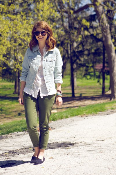 Light blue denim jacket with white linen blouse and green slim fit trousers