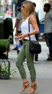 white tank top with army green cuffed pants and wedge sandals