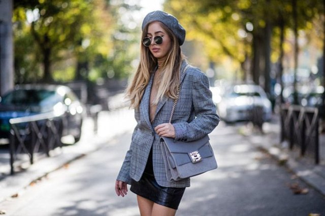 Gray tweed check oversized blazer with black leather mini skirt