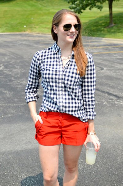 black and white checked shirt with red shorts