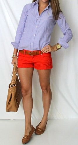 Light blue shirt with buttons and red shorts with mini belt