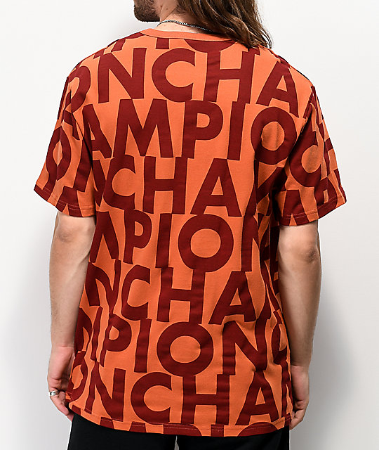 Champion Allover Print Block Text Orange T-Shirt |  Zumi