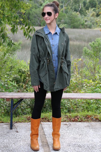 Olive green boyfriend jacket with light blue button down chambray shirt and leather boots