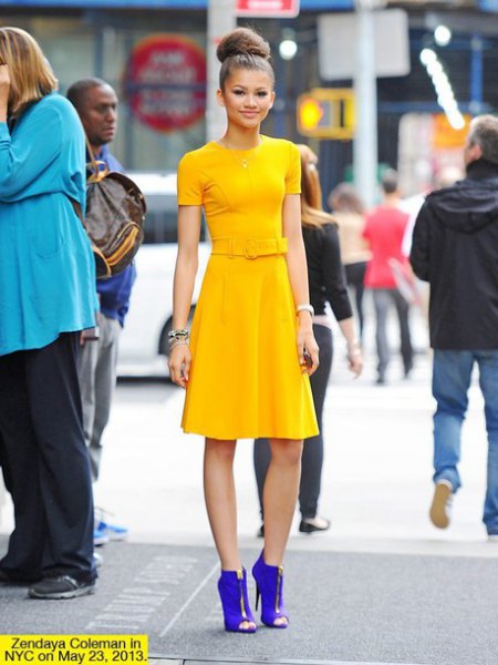 Yellow flare fit knee length dress with royal blue open toe ankle boots
