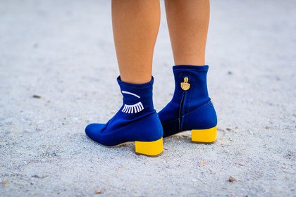 Royal blue and lemon yellow ankle boots with a white mini dress