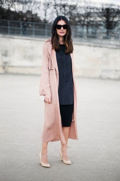 Dark blue button down shirt dress, pink trench coat with long lines and blush heels
