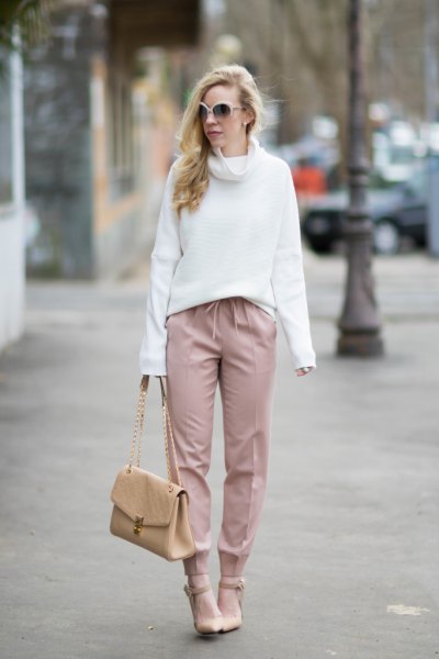 white cowl neck sweater with blush pants and heels