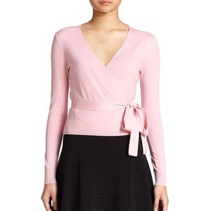 pale pink sweater, black skater skirt