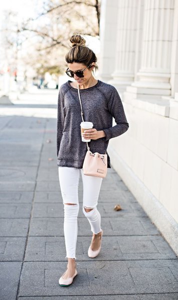 Heather gray chunky sweatshirt, white ripped skinny jeans