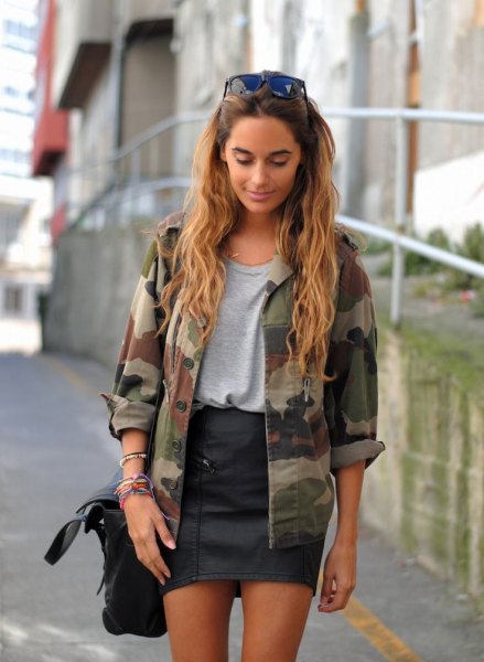 Camouflage jacket gray t-shirt black leather skirt