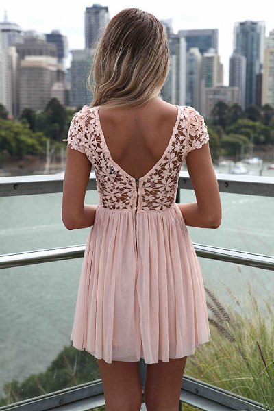 white pleated lace mini dress with floral pattern