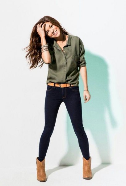 green button down shirt, dark blue skinny jeans and camel boots