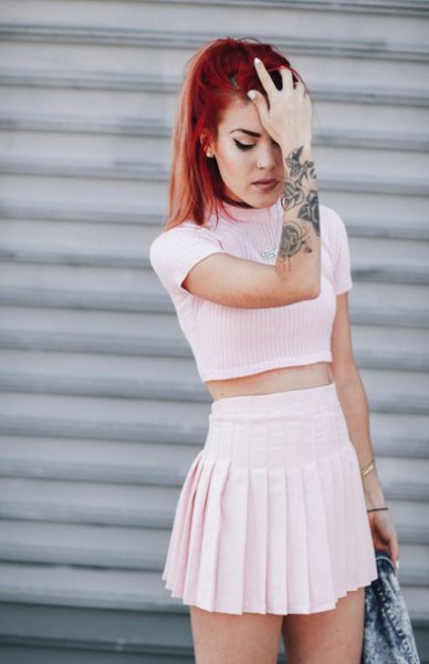 white short-sleeved sweater with mock neck and mini skirt