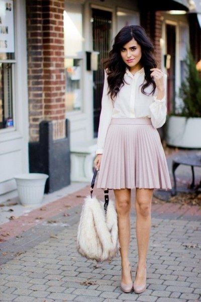 white chiffon shirt with buttons and light gray pleated mini skirt