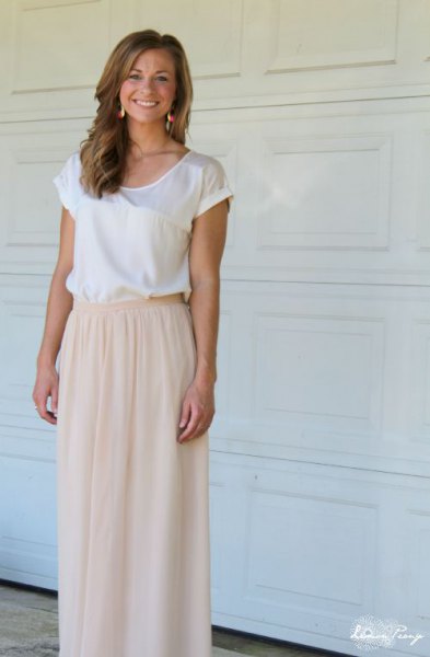 white silk top with cap sleeves and light pink, elastic, long tulle skirt