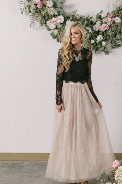 black lace bodice with scalloped hemline and floor-length light pink tulle skirt