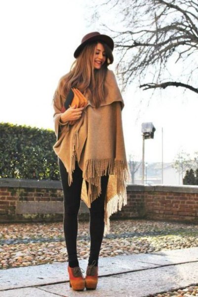 Blanket scarf with crepe fringes, leggings and orange suede boots