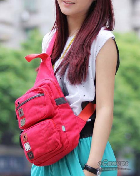 white sleeveless top with sky blue skirt and pink shoulder bag