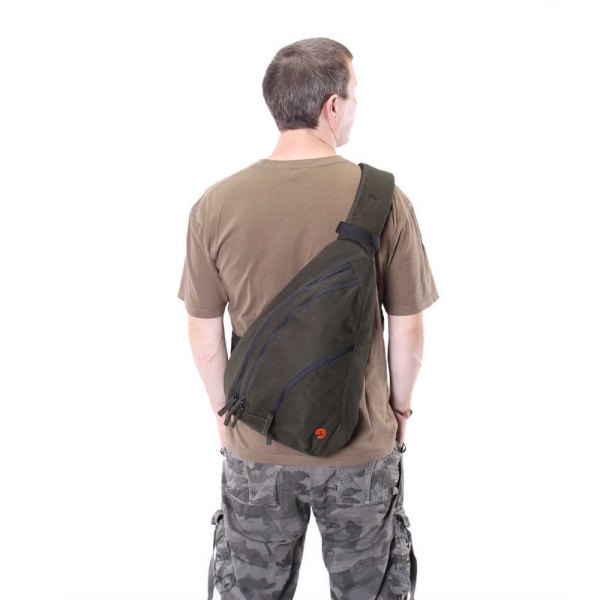 green canvas bag with camo pants