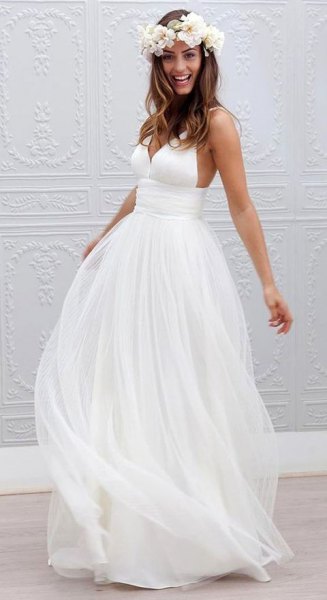 Floor-length, flowing wedding dress made of white chiffon