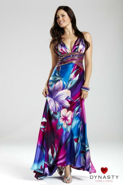 Hawaiian wedding dress with a blue and white floral pattern and a plunging V-neckline