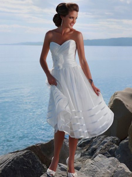 Strapless midi wedding dress with a white fit and flare