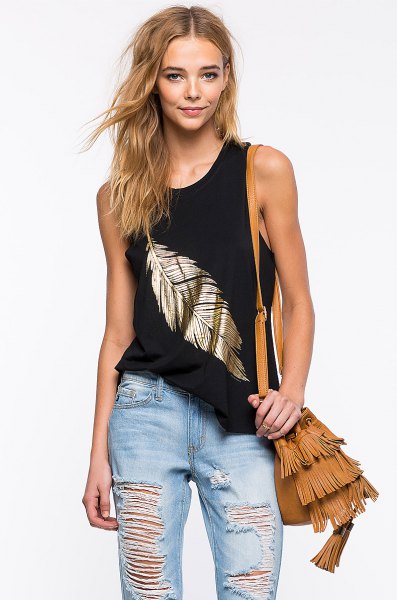 black and gold vest top with ripped boyfriend jeans