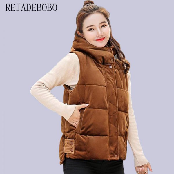 gold-brown thick quilted vest with light pink sweater
