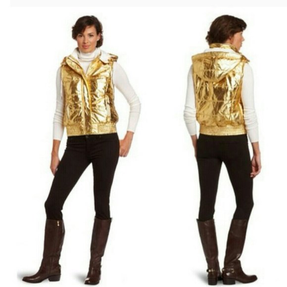 Shiny gold hooded vest with white long sleeve t-shirt with high neck