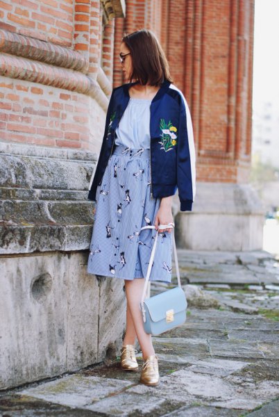 Navy blue embroidered jacket with high waist skirt