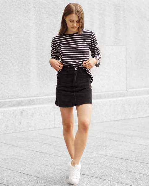 black and white striped long-sleeved T-shirt with a high corduroy skirt