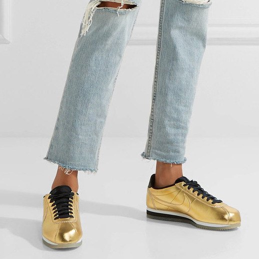 Light blue ripped skinny pants with gold comfortable walking shoes