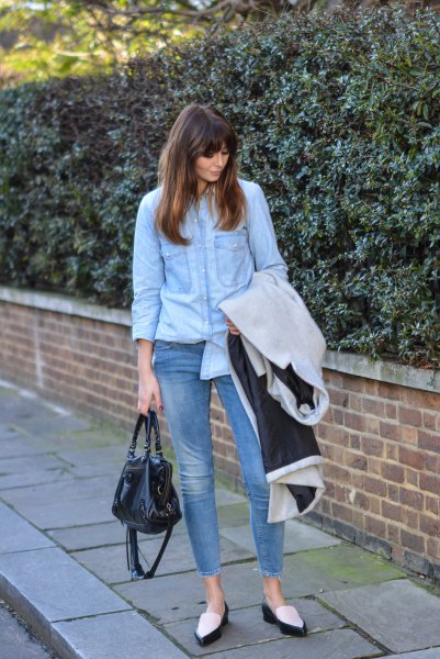 Light blue button down shirt, ankle jeans and white and black pointy toe slippers