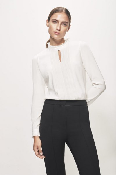Keyhole silk blouse with mock neck and black high-rise chinos