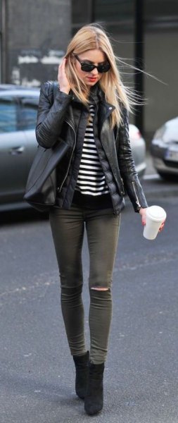 black short boots with leather jacket and gray skinny jeans