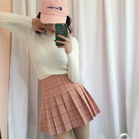 white bodycon sweater with pink plaid skirt and white baseball cap
