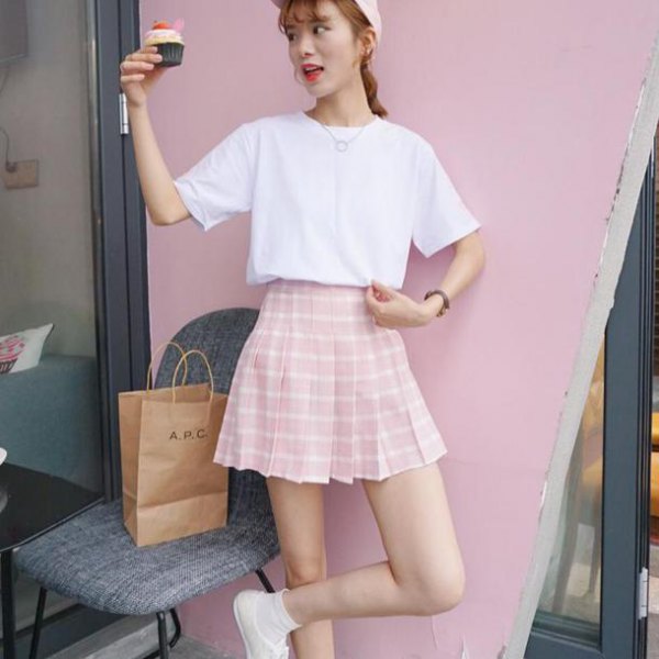 Relaxed fit white t-shirt and pink and white plaid skater skirt