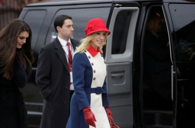red bush hat with white and blue coat dress
