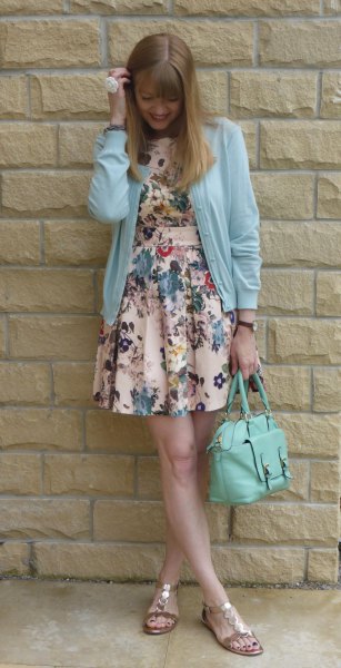 sky blue cardigan with floral printed mini dress and golden sandals