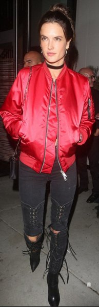 red bomber jacket with black skinny jeans