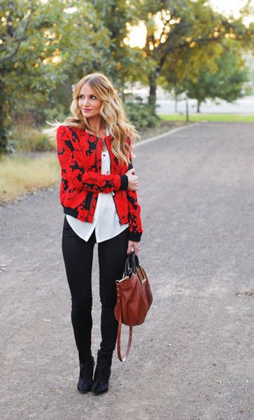 red and black printed jacket with white button down blouse